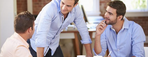 Group Of Businessmen Meeting To Discuss Ideas Group Of Businessmen Meeting To Discuss Ideas